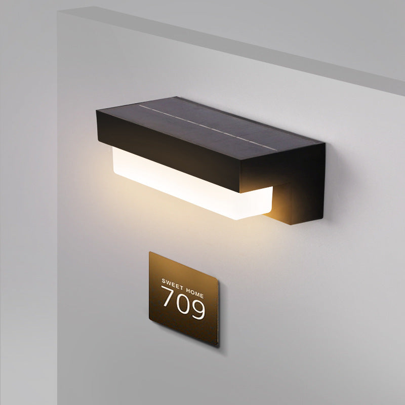 Outdoor solar panel wall light