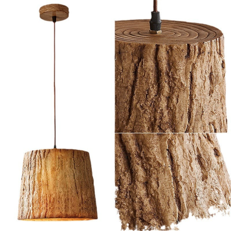 Pendant lamp made of wooden logs