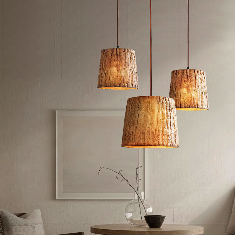 Pendant lamp made of wooden logs